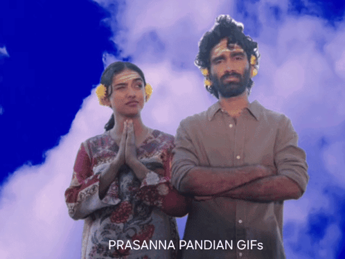 A Man And A Woman Are Standing Next To Each Other And The Words Prasanna Pandian Gifs Are On The Bottom GIF