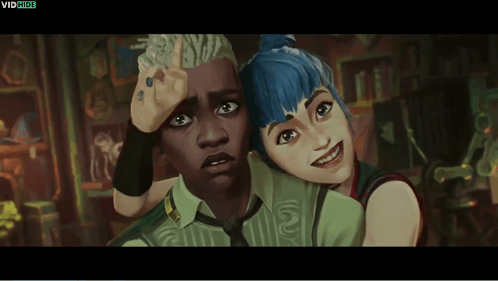 A Man And A Woman Are Standing Next To Each Other And The Words Vidhide Are On The Bottom GIF