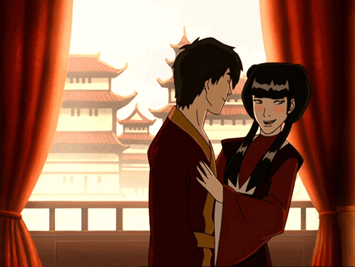 A Man And A Woman Are Standing Next To Each Other GIF