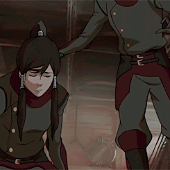 A Man And A Woman Are Standing Next To Each Other In A Cartoon GIF