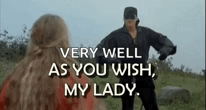 A Man And A Woman Are Standing Next To Each Other In A Field . GIF