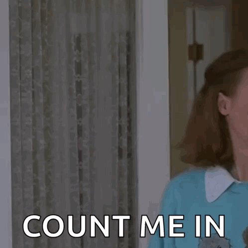 A Man And A Woman Are Standing Next To Each Other In A Room And The Woman Is Asking The Man To Count Her In . GIF