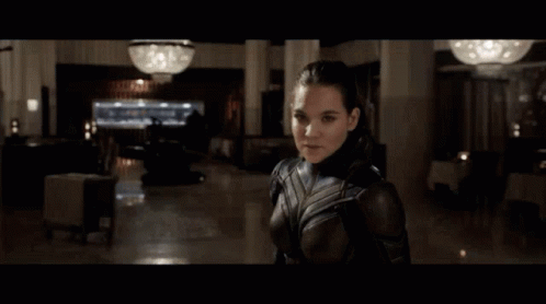 Man And Woman Standing In Room GIF