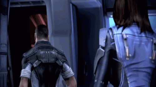 A Man And A Woman Are Standing Next To Each Other In A Room In A Video Game GIF