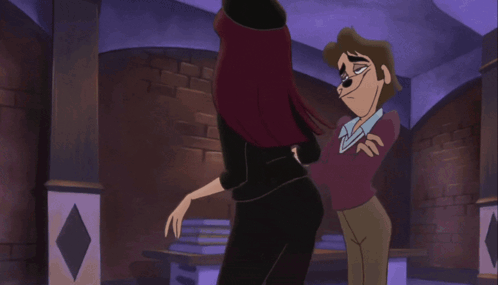 A Man And A Woman Are Standing Next To Each Other In A Room GIF