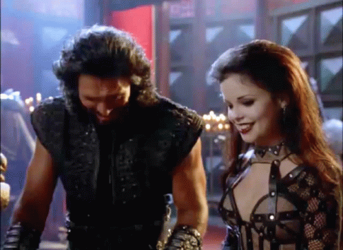 Man And Woman In Room With Candles GIF