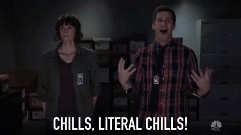 A Man And A Woman Are Standing Next To Each Other In A Room With The Words `` Chills , Literal Chills '' . GIF