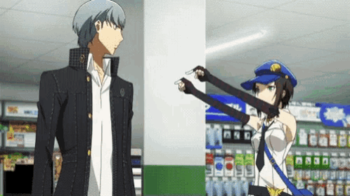 A Man And A Woman Are Standing Next To Each Other In A Store . The Woman Is Wearing A Police Uniform . GIF