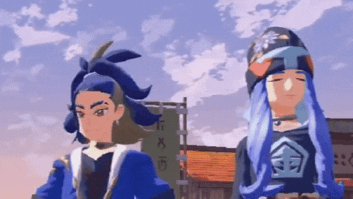 Man And Woman Standing In Front Of Building GIF