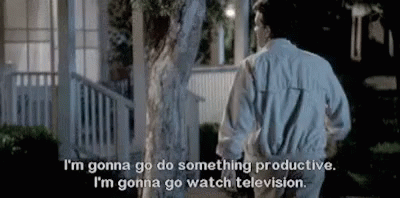 A Man And A Woman Are Standing Next To Each Other In Front Of A House . GIF