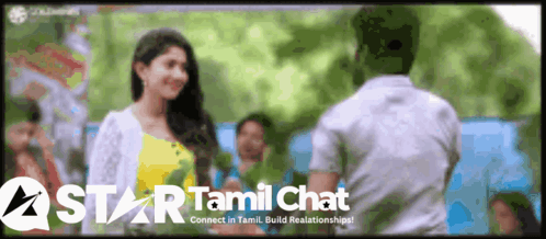 A Man And A Woman Are Standing Next To Each Other In Front Of A Sign That Says Star Tamil Chat GIF