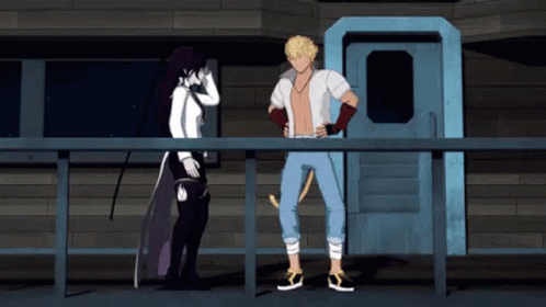A Man And A Woman Are Standing Next To Each Other On A Fence . GIF