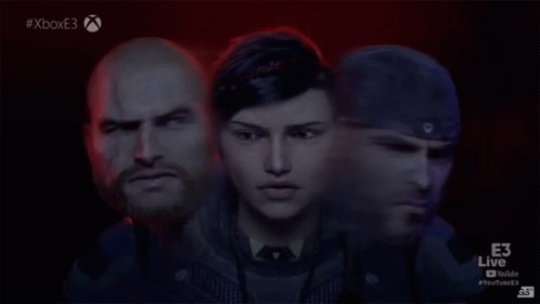 A Man And A Woman Are Standing Next To Each Other GIF
