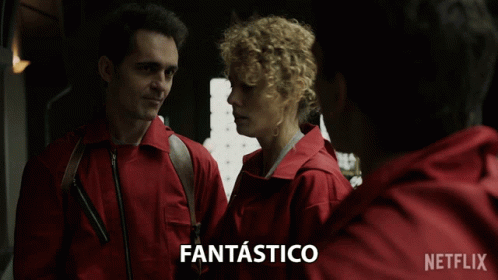 A Man And A Woman Are Standing Next To Each Other With Fantastico Written On The Bottom GIF