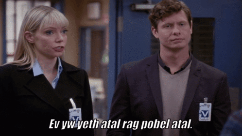A Man And A Woman Are Standing Next To Each Other With The Man Saying Ev Yw Yeth Atal Rag Pobel Atal GIF