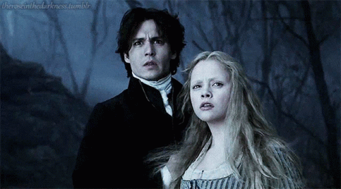 A Man And A Woman Are Standing Next To Each Other With The Words Theresinthedarkness.tumblr Visible In The Corner GIF