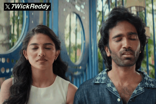 A Man And A Woman Are Standing Next To Each Other With Their Eyes Closed And A 7Wick Reddy Logo In The Corner GIF