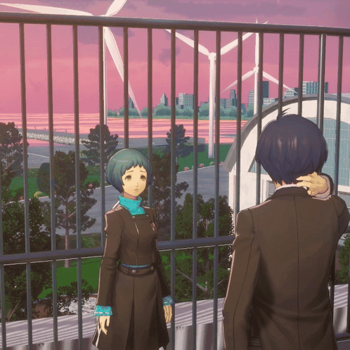 A Man And A Woman Are Standing On A Balcony Looking Out At A City GIF