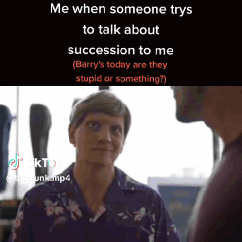 A Man And A Woman Are Talking About Succession GIF