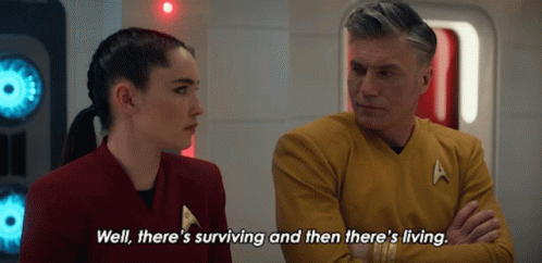 A Man And A Woman Are Talking And The Man Says Well There 'S Surviving And Then There 'S Living .. GIF