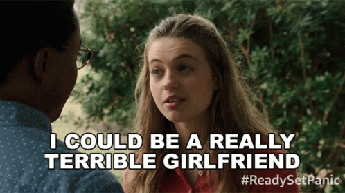 A Man And A Woman Are Talking And The Woman Says I Could Be A Really Terrible Girlfriend GIF
