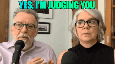 A Man And A Woman Are Talking Into Microphones With A Caption That Says Yes I 'M Judging You GIF