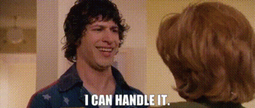 a man and a woman are talking to each other and the man is smiling and saying i can handle it .