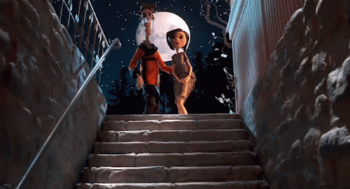 A Man And A Woman Are Walking Down A Set Of Stairs GIF