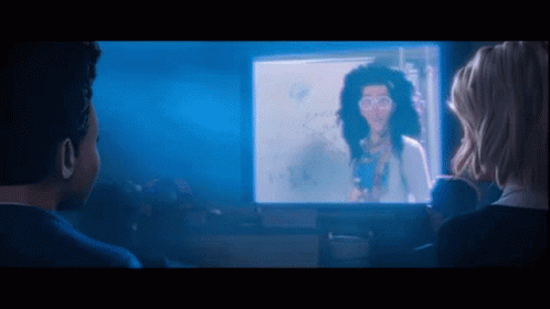 Man And Woman Watching Video On Computer GIF