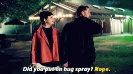 A Man And A Woman Holding Hands In Front Of A House With The Words Did You Put On Bug Spray ? Nope . GIF