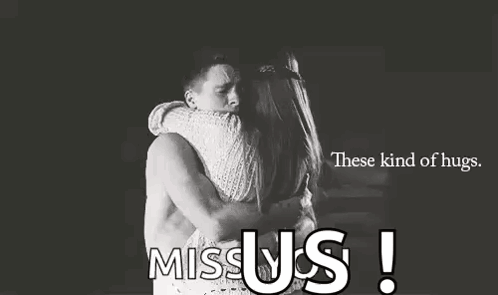 A Man And A Woman Hugging Each Other In A Black And White Photo With The Words `` These Kind Of Hugs . '' GIF