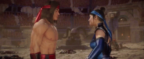 A Man And A Woman Hugging Each Other In A Video Game . GIF
