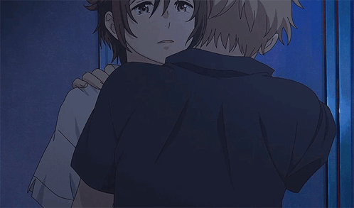 A Man And A Woman Hugging Each Other With The Woman Wearing A Bracelet On Her Wrist GIF