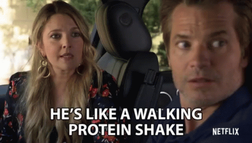 A Man And A Woman In A Car With The Words He 'S Like A Walking Protein Shake On The Screen GIF