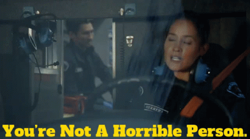 A Man And A Woman In An Ambulance With The Words You 'Re Not A Horrible Person GIF