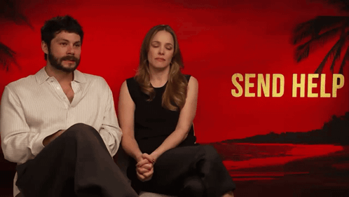 a man and a woman sit in front of a red background that says " send help "