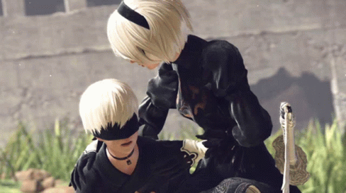 A Man And A Woman Standing Next To Each Other GIF
