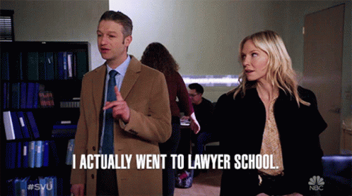 Man And Woman Next To Each Other With I Actually Went To Lawyer School Caption GIF