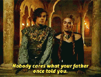 A Man And A Woman Standing Next To Each Other With Nobody Cares What Your Father Once Told You Written On The Bottom GIF