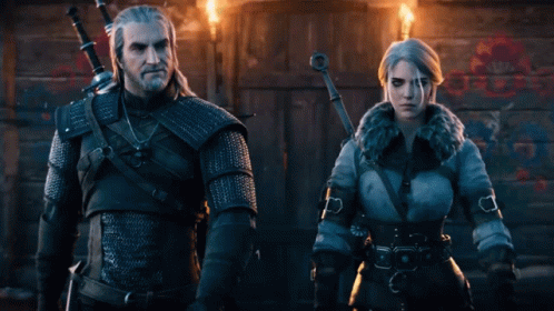 A Man And A Woman Standing Next To Each Other With Swords GIF