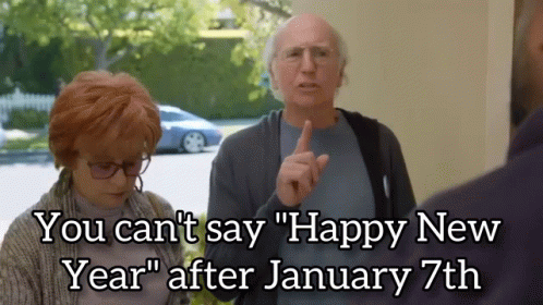 A Man And A Woman Standing Next To Each Other With The Caption " You Can 'T Say Happy New Year " GIF