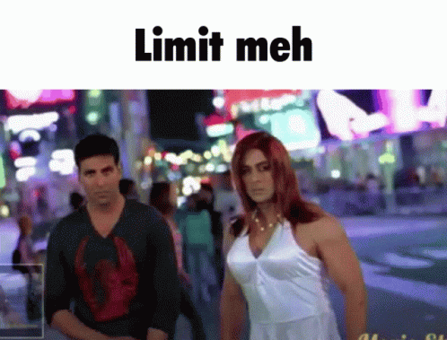 A Man And A Woman Standing Next To Each Other With The Words Limit Meh Written Above Them GIF