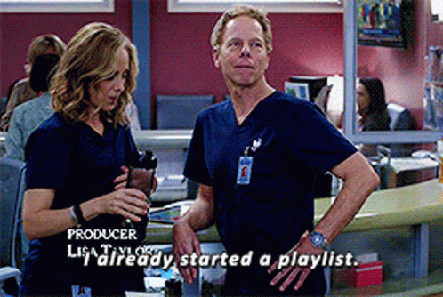 A Man And A Woman Standing Next To Each Other With The Words Producer Lisa Taylor Already Started A Playlist Below Them GIF