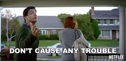 A Man And A Woman Standing On A Porch With The Words " Don 'T Cause Any Trouble " Written On The Bottom GIF
