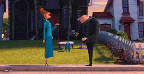 A Man And A Woman Standing On The Sidewalk In Front Of A House GIF