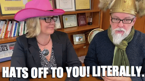 A Man And A Woman Wearing Hats With The Words Hats Off To You Literally On The Bottom GIF