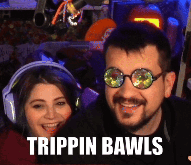 A Man And A Woman Wearing Headphones And Glasses With The Words Trippin Bawls On The Bottom GIF