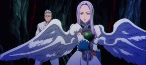 A Man And A Woman With Wings Are Standing Next To Each Other In A Cave . GIF