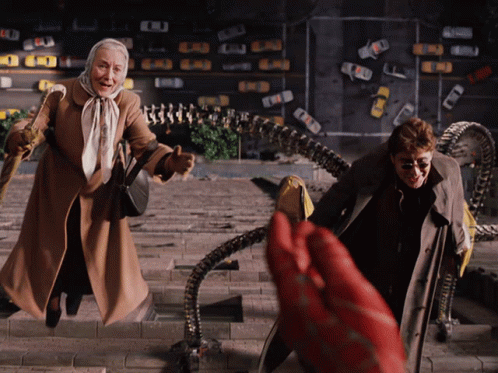 a man and an elderly woman are walking down a set of stairs