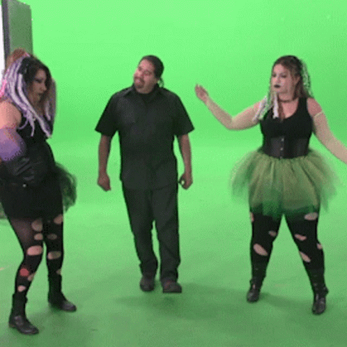 Man And Two Women Standing On Green Screen GIF